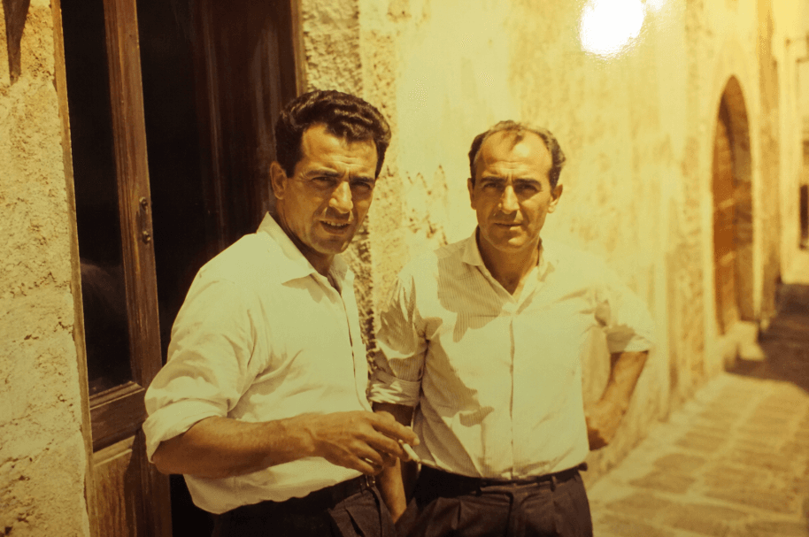 Two men standing in a doorway, photographed in 1971. Nobody has recorded who they are.